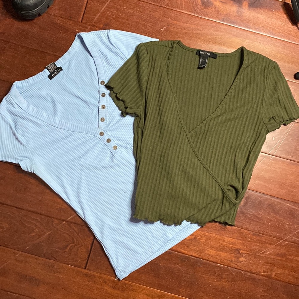 Baby blue and green cleavage shirts.